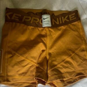 Nike Women's Orange Pro Shorts